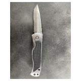 Folding pocket knife in a nylon sheath