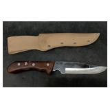 Vintage hunting knife with synthetic sheath10.75",