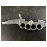 Vintage United model UC77 folding knife with knuck