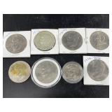 Eisenhower dollars, Kennedy halves, no silver