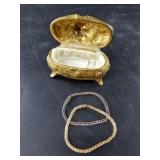Trinket box with 2 bracelets in different tones