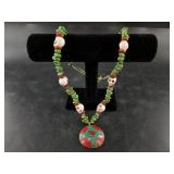 Statement necklace with natural stones carved into