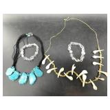 4 Pieces of jewelry: 2 quartz bracelets, 1 buffalo