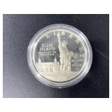 1986 S Nation of Immigrants silver dollar