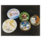 Collection of Fur Rondy pins and booster buttons