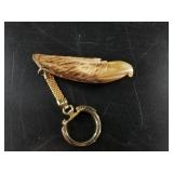 Stunning fossilized ivory keychain, carved to show
