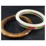 Two bangles: 1 is pieced together bone, other is a