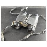 Pair of antique Swift 7x35 Binoculars with strap (