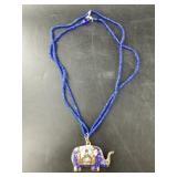 Enameled elephant pendant about 3" long with cobal