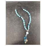 Statement necklace with faux turquoise and artisan