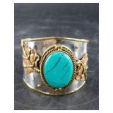 Very unique cuff style bracelet with faux turquois