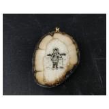 Ancient ivory pendant with scrimshaw, broken bale