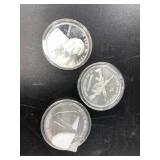 3  Assorted 1 troy oz. .999 silver rounds, 1 comme