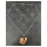 Artisan glass pendant with a sterling silver chain