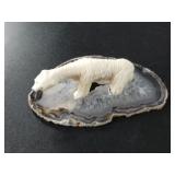 Carved ivory polar bear on a gorgeous agate slice