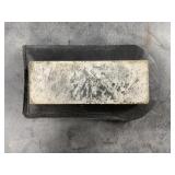 Small sharpening stone in a leather case, stone is