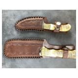 Two skinning knives with bone scales, brass bolste