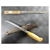 2 Filet knives 1 is in sheath