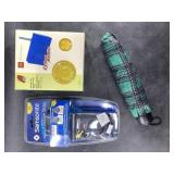 Luggage tag, umbrella and rubber bound radio