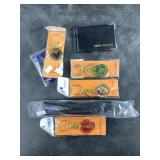 Collection of souvenir key rings, card holder and