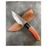 Damascus bladed knife with leather sheath wood and