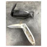 Folding knife with nylon pouch