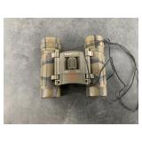 Tasco 8x21 binoculars in case