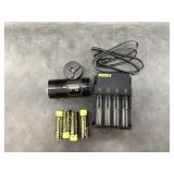Lot with a Nitecore model TM06S 4000 lumen searchl