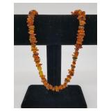 Amber necklace with variety of color and size piec