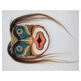 Tlingit style wood wall hanging mask with water bu