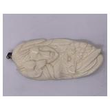Native American style bone pendant with huntress,