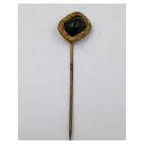 Gold toned and jade stick pin