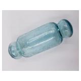 Oblong glass fishing float, about 5" long