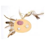 Tunghap clay and trade bead mask with feathers