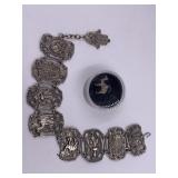 Several pieces of camel themed jewelry including a