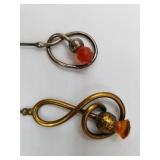 Pair of silver-plate vintage stick pins
