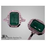 Platinum natural Emerald beryl and diamond ring. A Platinum natural Emerald beryl and diamond ring. A