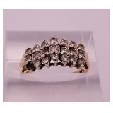 10k gold and diamond ring, size 6.5. It has dozens 10k gold and diamond ring, size 6.5. It has dozens