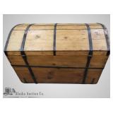 Enormous antique wood trunk with lock and iron ban