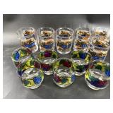 Two sets of glass tumblers
