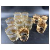 Two sets of glass tumblers