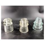 3 Clear glass insulators