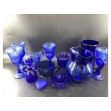 Cobalt blue glassware including vintage avon