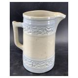 Antique German stoneware pitcher with traditional