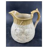 Beautiful antique German stoneware pitcher depicti