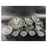 Many crystal and clear glass dishes