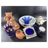 Variety of porcelain figurines and tea lite holder