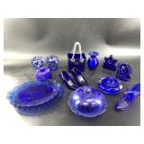 Cobalt glass dï¿½cor including Fenton glass shoe