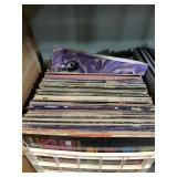 Large box lot of records with mixed genres