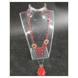 Pair of vintage red necklaces highly detailed